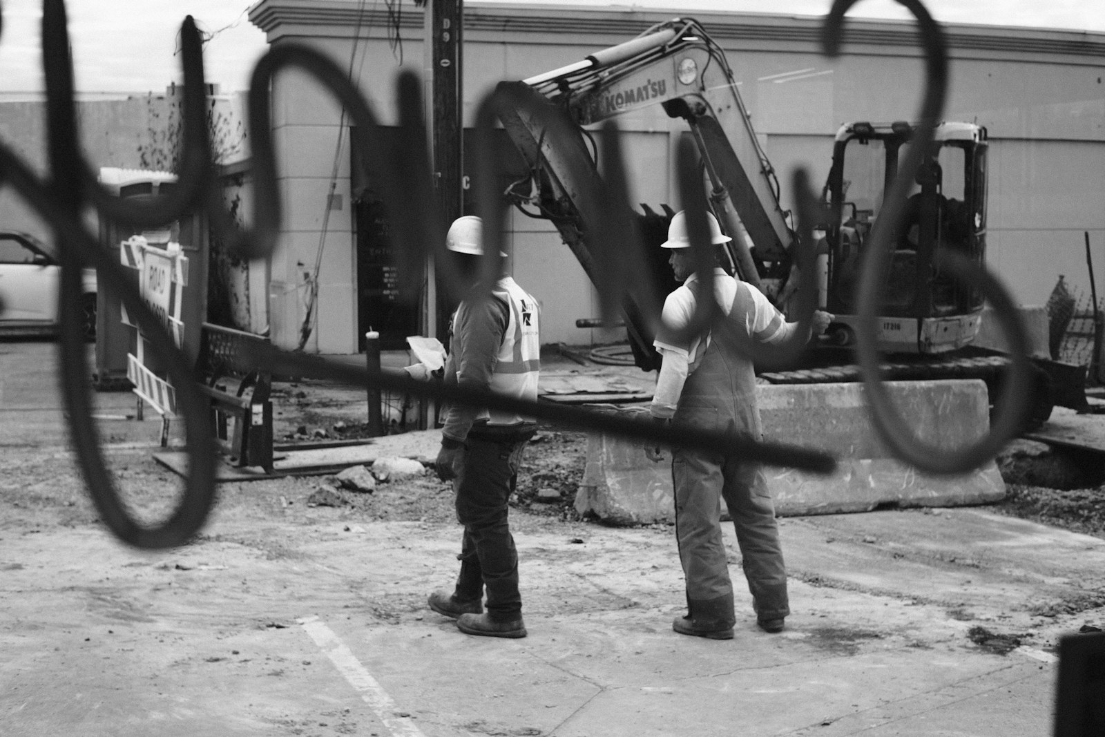 a few men working on a machine